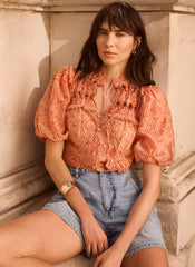 Orange Printed Cut Out Tie Blouse