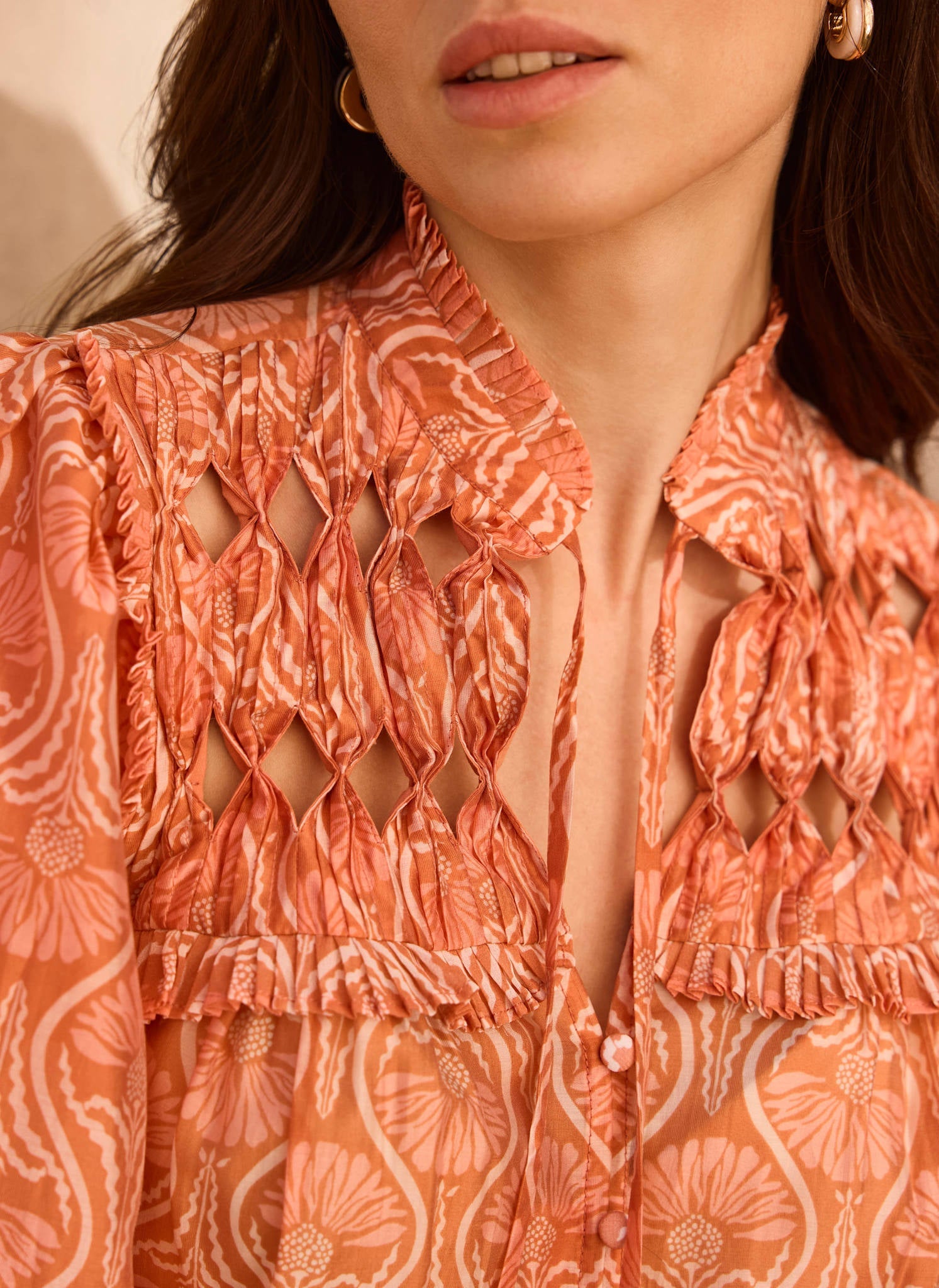 Orange Printed Cut Out Tie Blouse